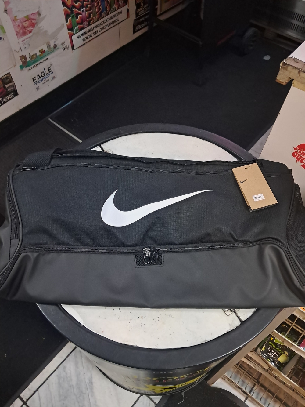 Nike Black Duffel with White Swoosh Logo